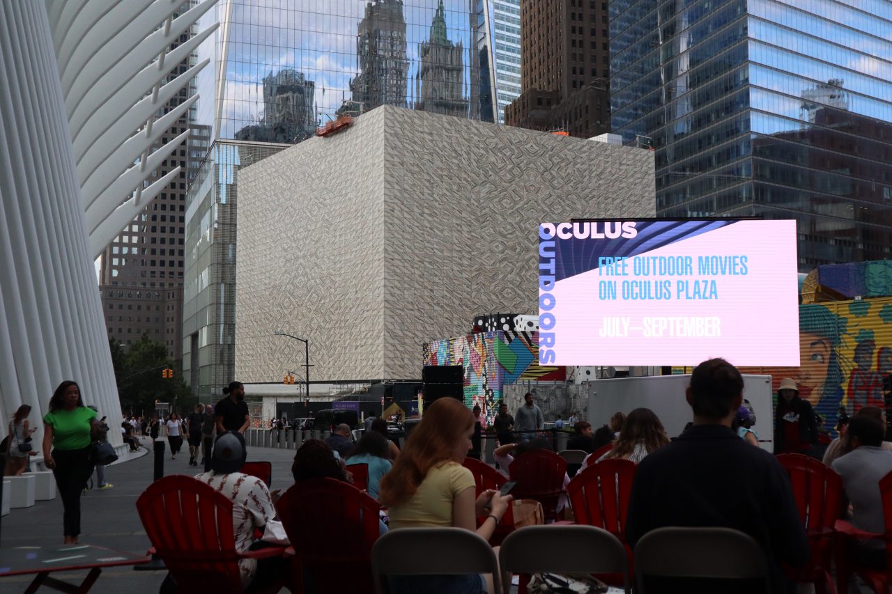 people watching a movie at world trade center